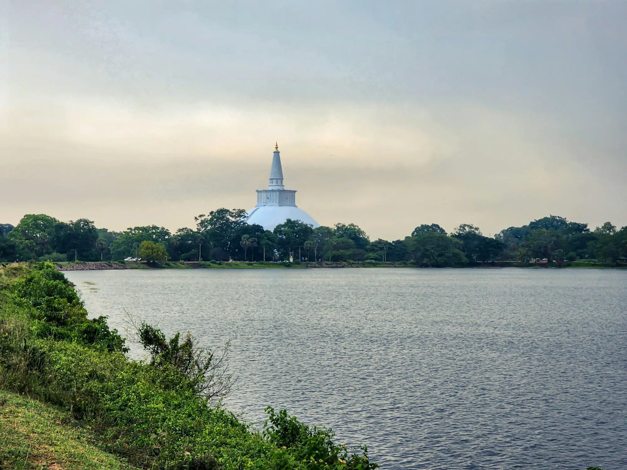 Ruwanwelisaya stupa across a tank, Anuradhapura