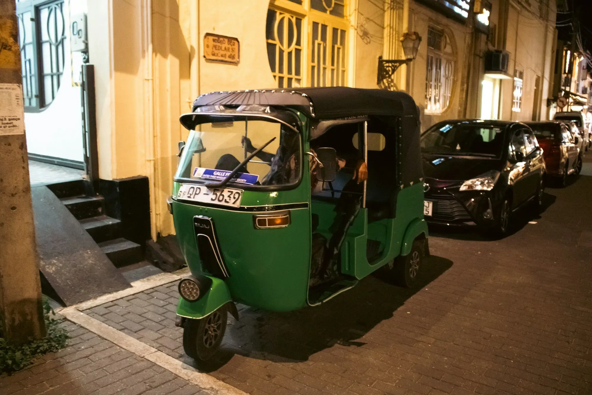 Green tuk-tuk on Pedlar Street, Galle Fort